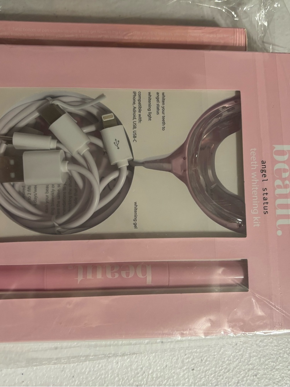 Beaut Angel Status Pink Teeth Whitening Kit with whitening pen.